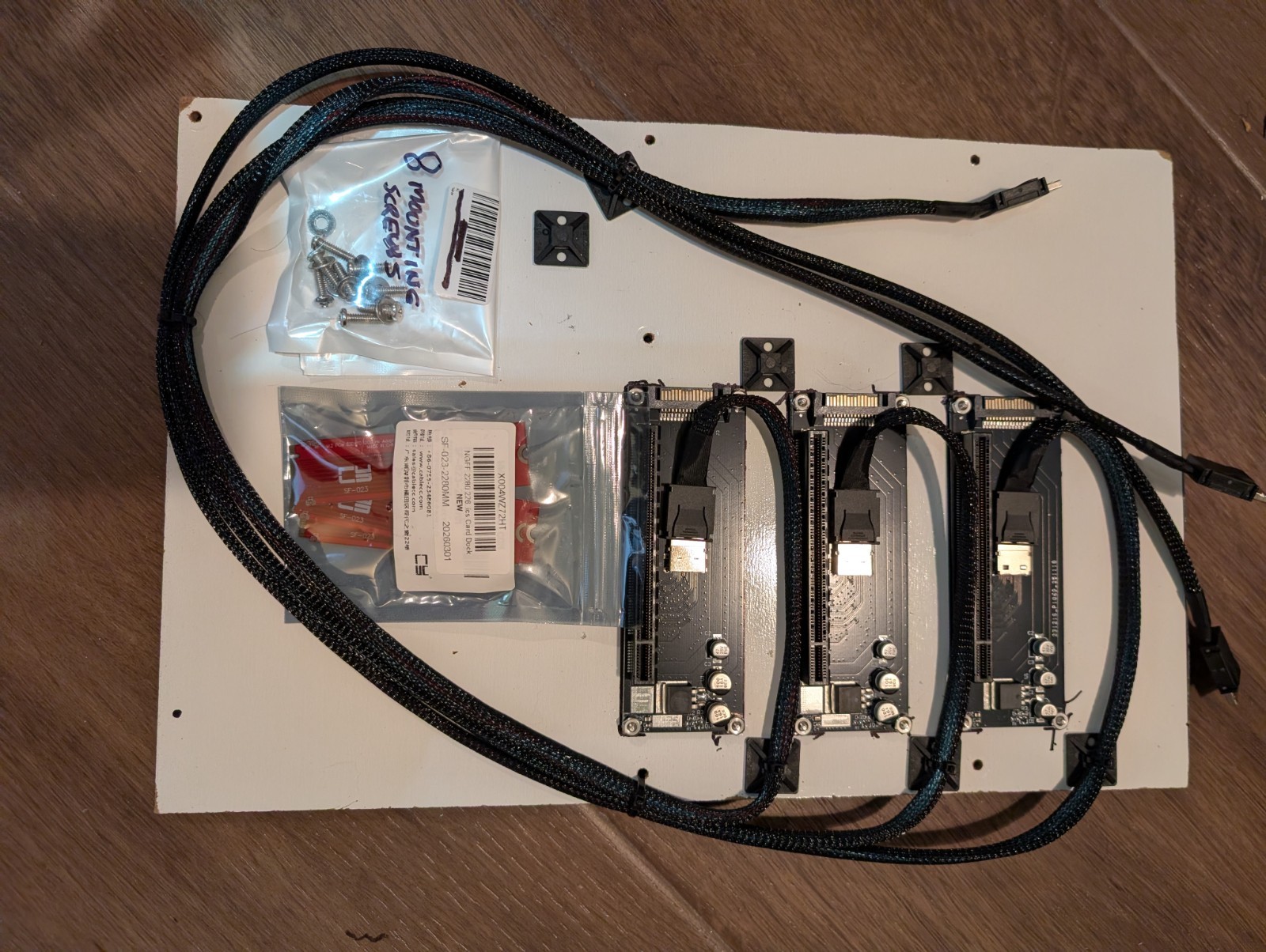 DYI GPU board for E-ATX case. 3 PCIe 4.0 x4 slots (3 wide) via M.2 cards