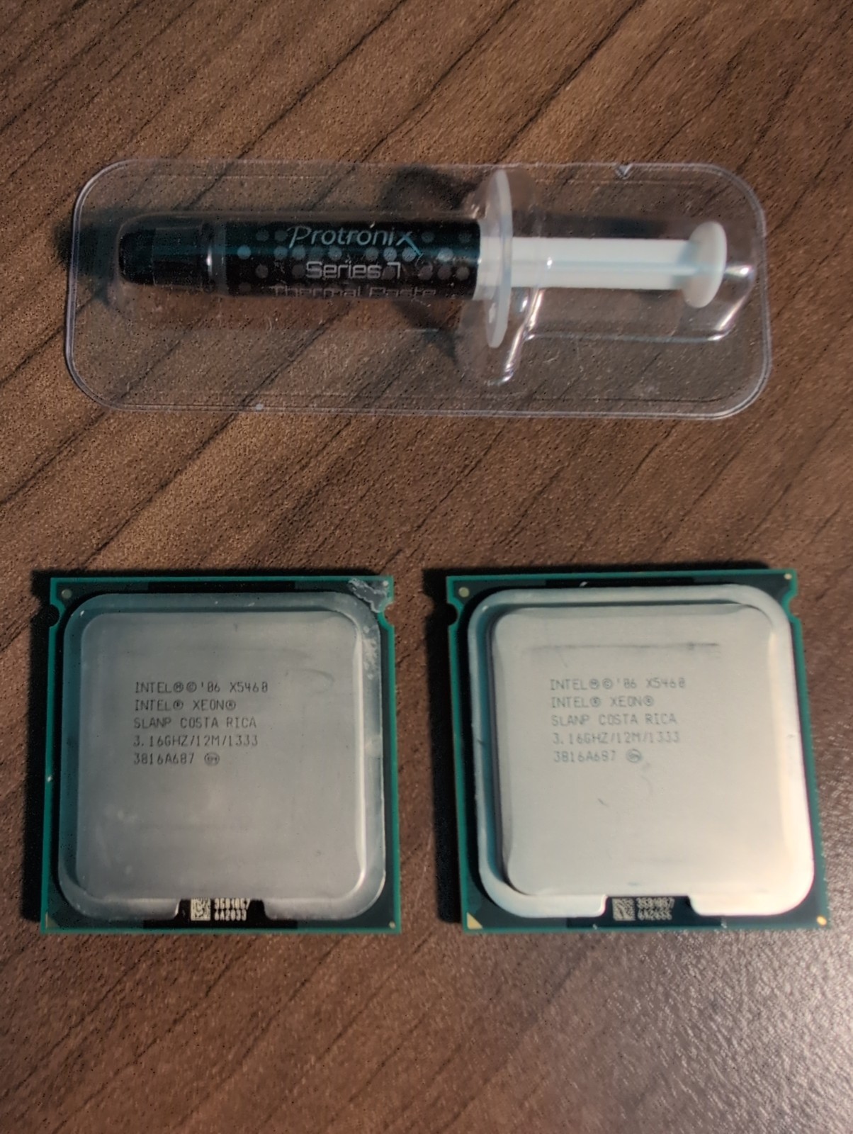 Matched pair Intel Xeon X5460 Quad Core 3.16GHz LGA771 CPU’s SLANP